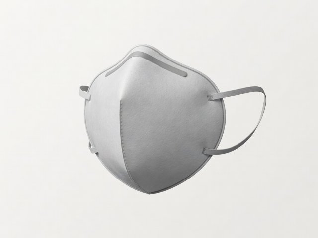 Unmarked filtering facepiece respirator shown as a soft-lit three-dimensional illustration